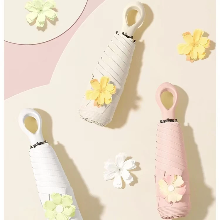 乐芙兰新款花朵伞迷你黑胶防晒遮阳伞小巧便携爱心柄太阳伞小清新