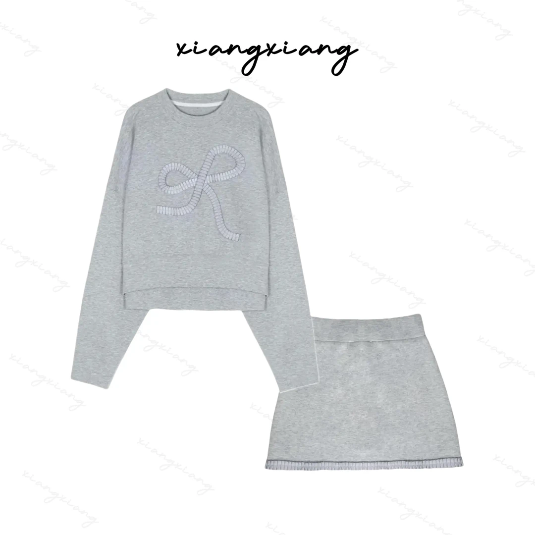 (香香专属)甜美蝴蝶结卫衣+流苏半身裙套装5086