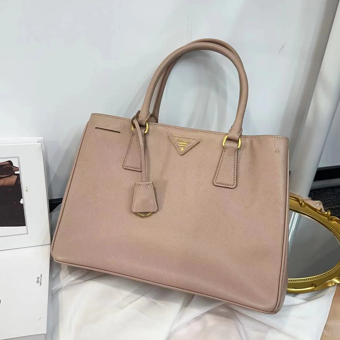 95新 Prada/普拉达 粉色普拉达杀手包/聪聪/95新/9529416