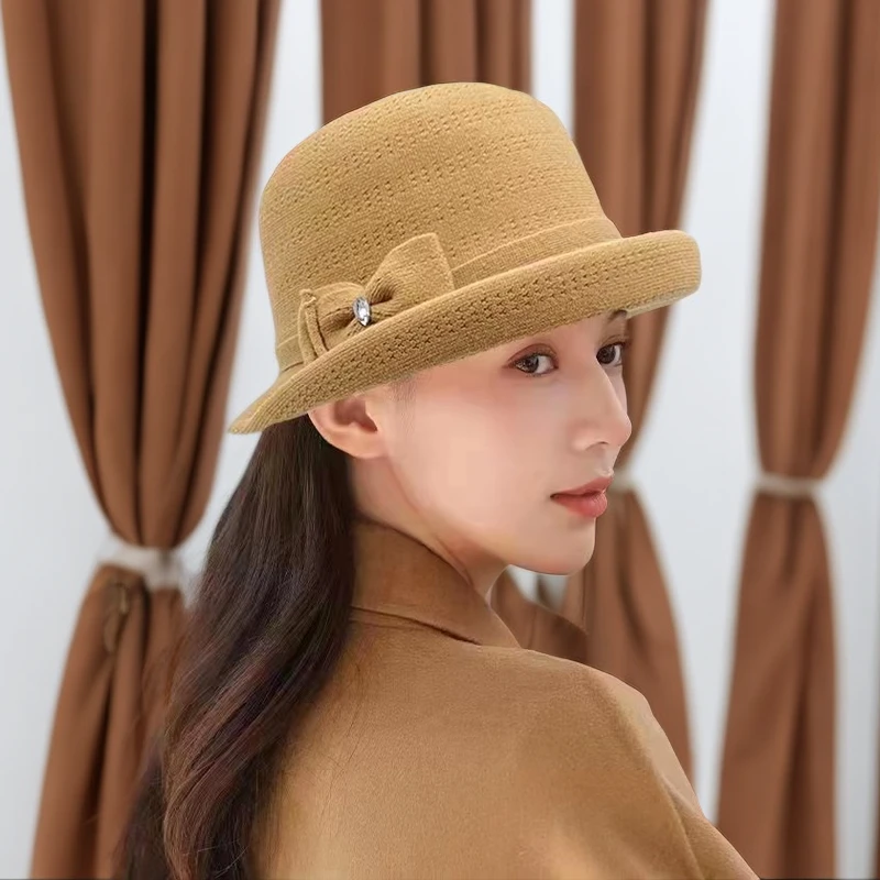 伴糖晓詹礼帽秋冬新款优雅气质毛绒蝴蝶结渔夫帽韩版百搭卷边盆帽