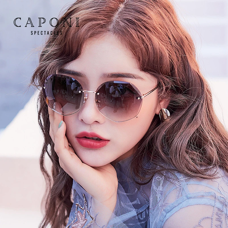 CAPONI渐变紫太阳眼镜无边框2025新款女士网红街拍防紫外线墨镜