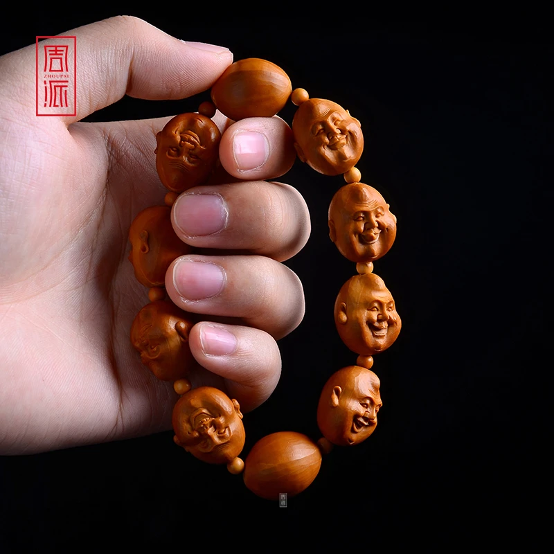 周派春毅核坊 笑佛橄榄核手串文玩收藏品老铁核纯手工雕刻精品