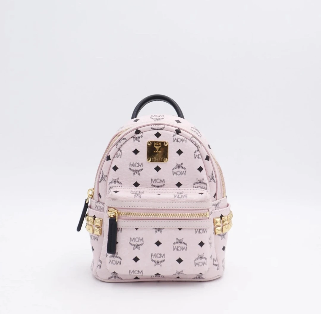 95新 MCM MCM 粉色mini双肩包 K15382