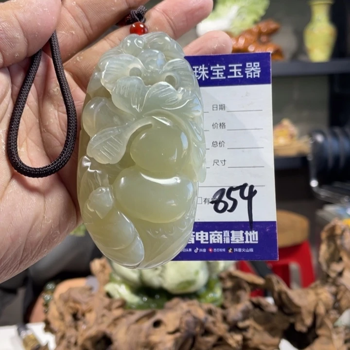 蛇纹石玉手把件未镶嵌林*财