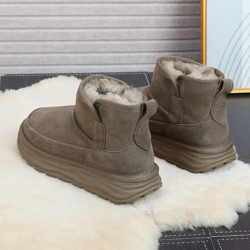 8586-8牛皮纯羊毛情侣款冬季雪地靴女加厚皮毛一体防滑东北大棉鞋