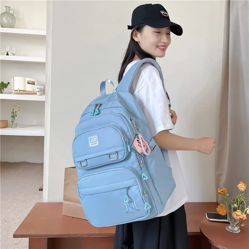 书包初中女生大容量减负护脊高颜值中学生防水五六年级小学生女孩