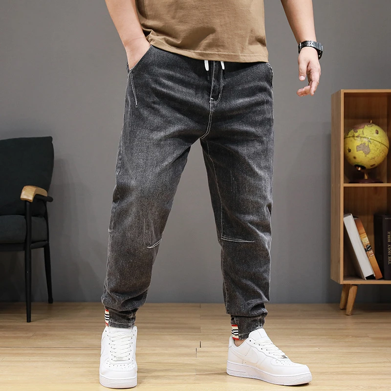 胖哈哈秋季加肥加大弹力松紧腰牛仔裤束脚简约宽松大码牛仔裤