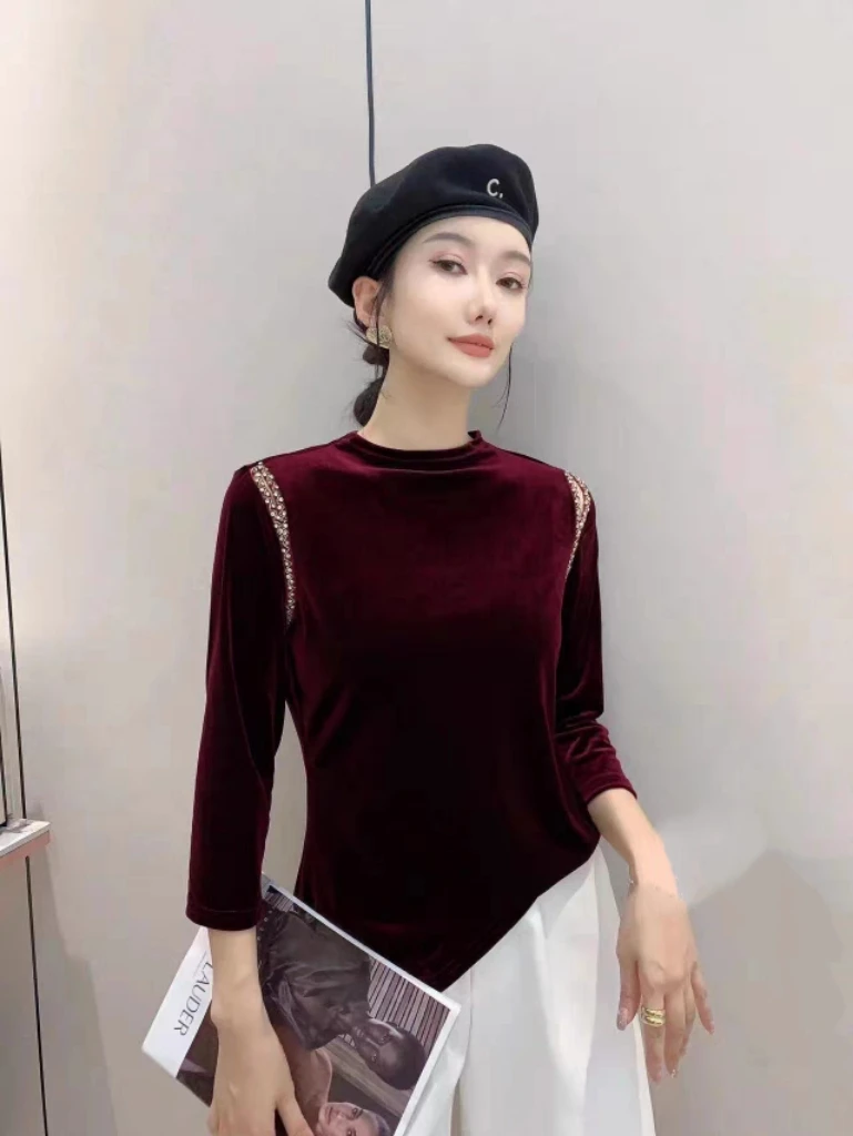 28579残品欧货肩膀镂空钉珠半高领洋气精致丝绒上衣