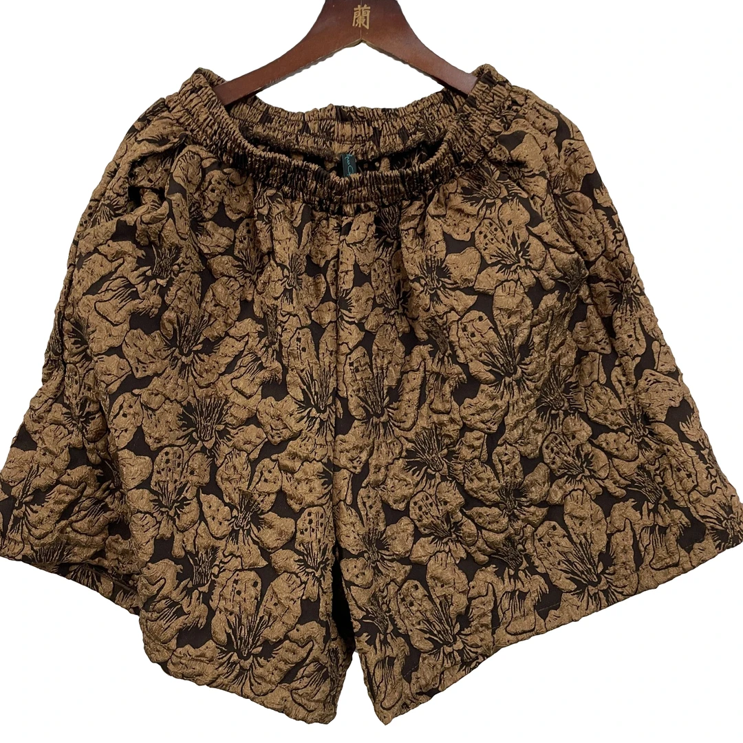 549/黑色重工压花轻奢工艺2024夏装松紧腰简约A字百搭夏季短裤