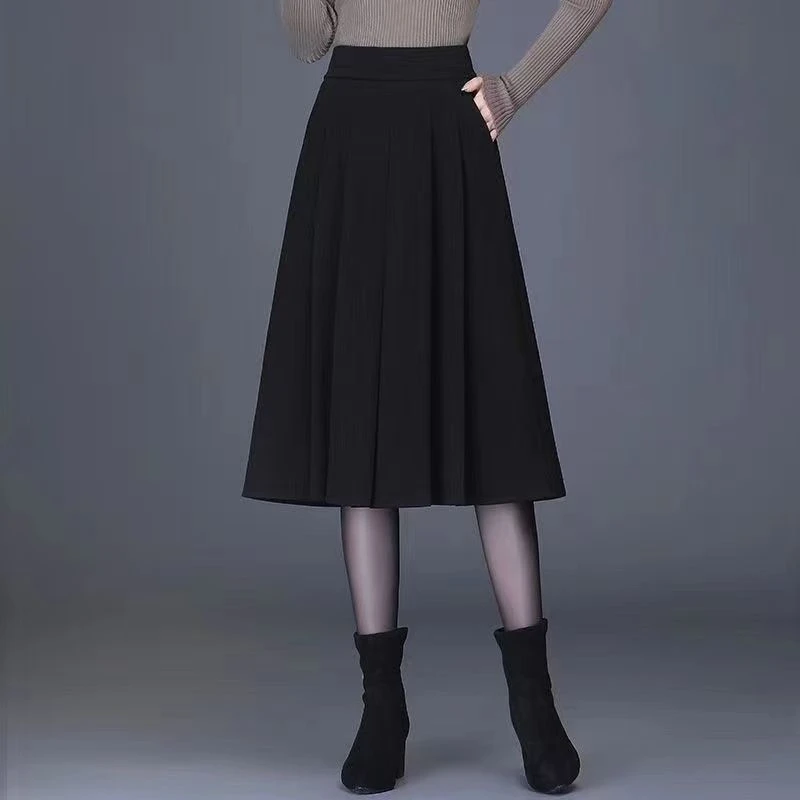 毛呢半身裙秋冬2023新款高腰显瘦口袋黑色女裙中长款a字裙七分裙
