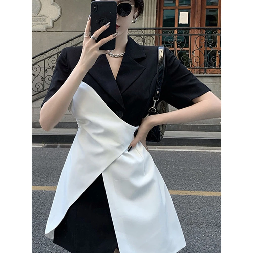 新款法式小众时尚气质镂空不规则显瘦小众修身夏季拼接连衣裙女