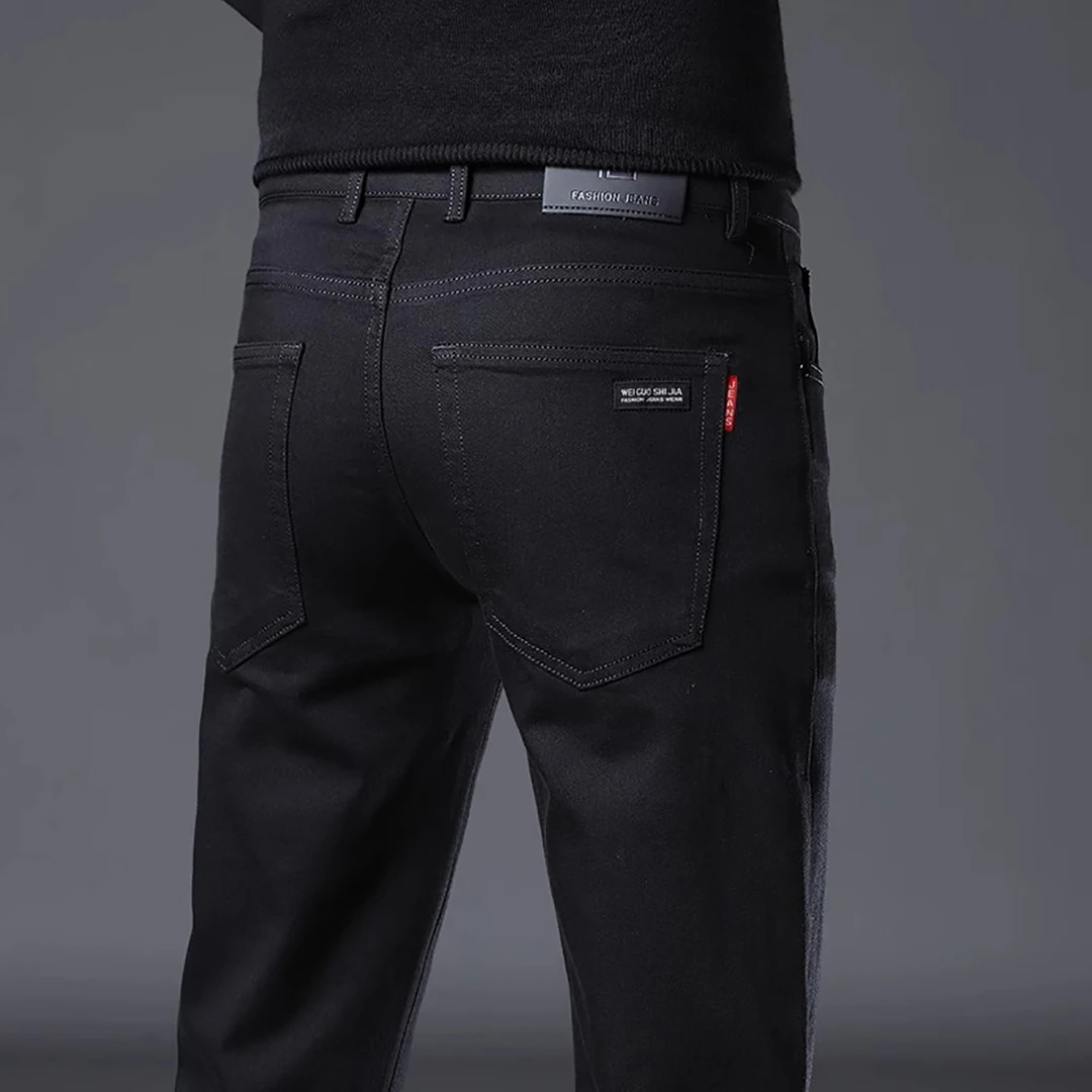 香港2024秋冬季高端黑色牛仔裤男士修身直筒潮牌百搭弹力休闲长裤