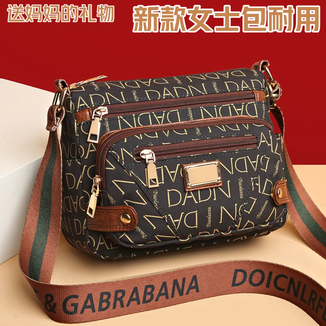 多层女士新款包耐用防水大容量放伞水杯手机包中年妈妈单肩斜挎包