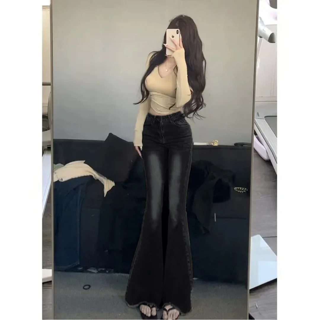 新款设计感复古破洞大喇叭牛仔裤女秋季高腰显瘦拖地毛边长裤