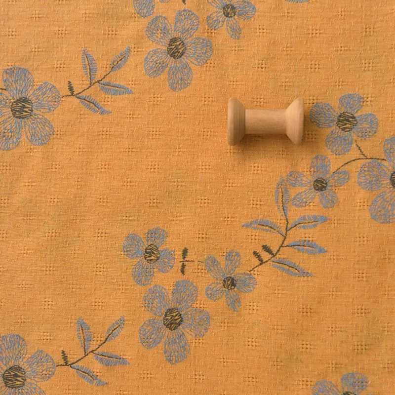 暗土黄色蓝印花涤棉布料 秋季禅意长袍开衫制衣汉服装长裙子面料