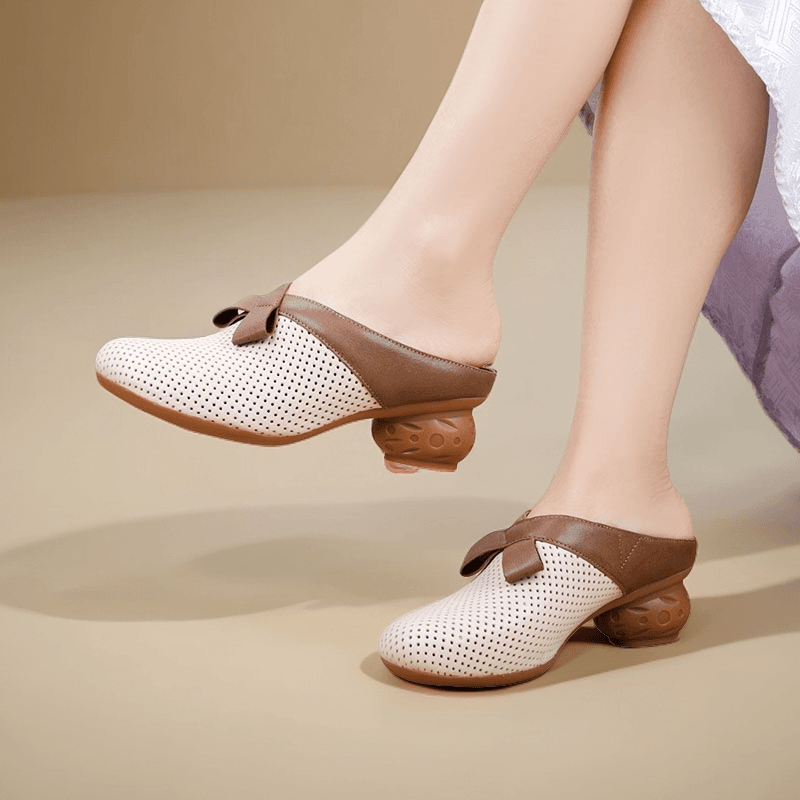 相伴夏季时尚透气舒适羊皮真皮女士镂空外穿休闲包头拖鞋女52813