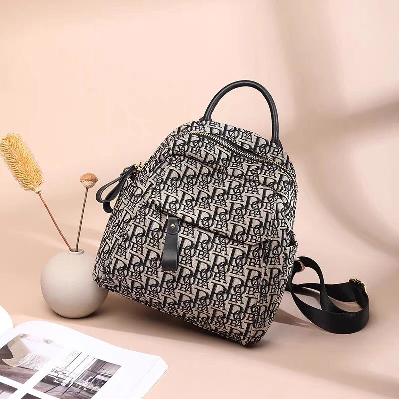 潮流印花双肩包女2024新款时尚百搭多功能小背包洋气轻便旅游包