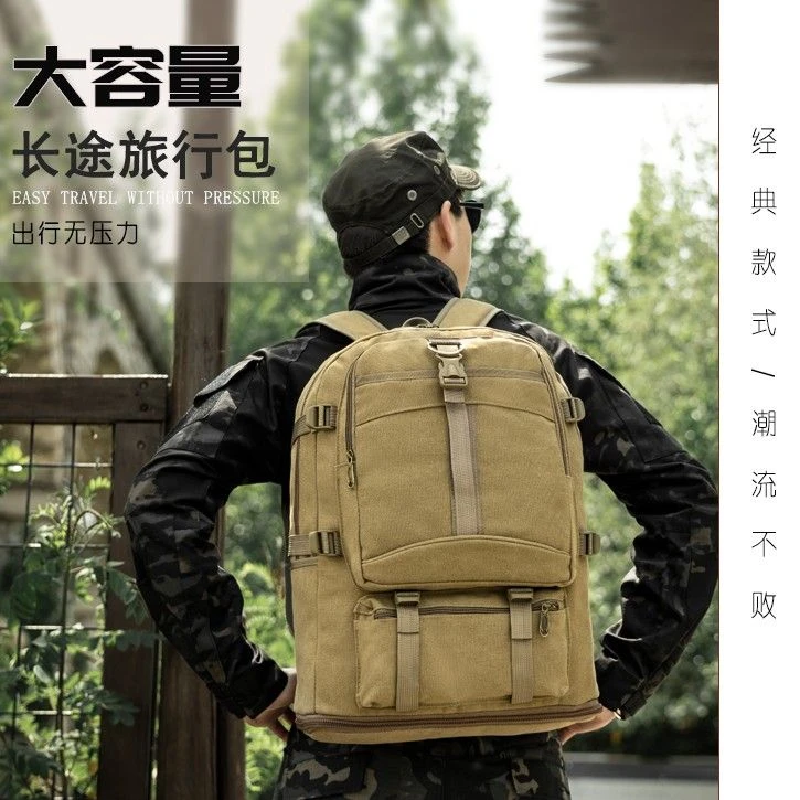 男大容量旅行包可扩容加厚帆布包男登山双肩包出差行李包减负背包