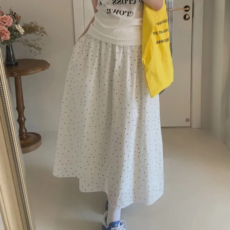 温柔风波点半身裙女夏季2025新款简约松紧腰遮胯显瘦a字超仙长裙