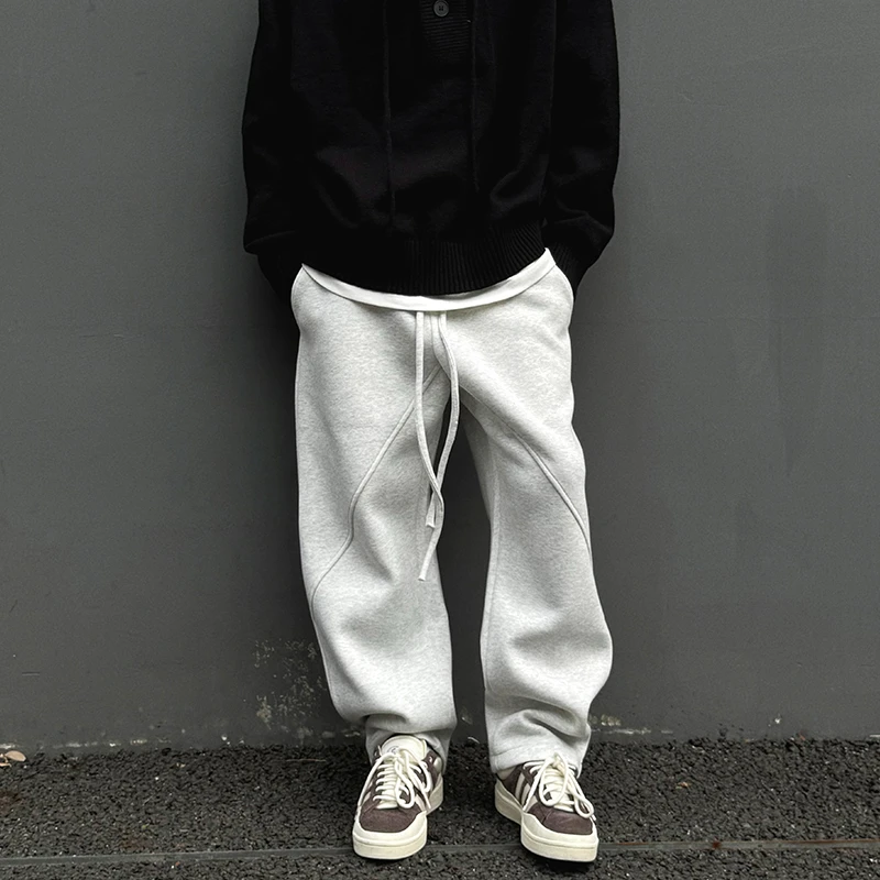 【UNAPS】秋冬500克加厚弯刀卫裤立体剪裁宽松休闲裤男女潮流长裤子