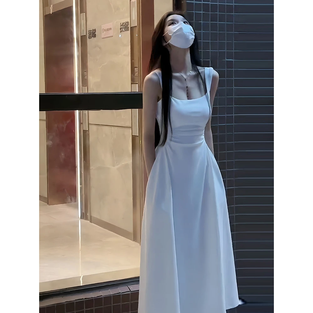 白色吊带连衣裙子女2024夏季新款法式茶歇小个子初恋收腰a字长裙