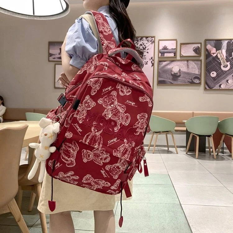 书包女时尚潮流印花双肩包护脊初中生校园高中生大容量高颜值背包
