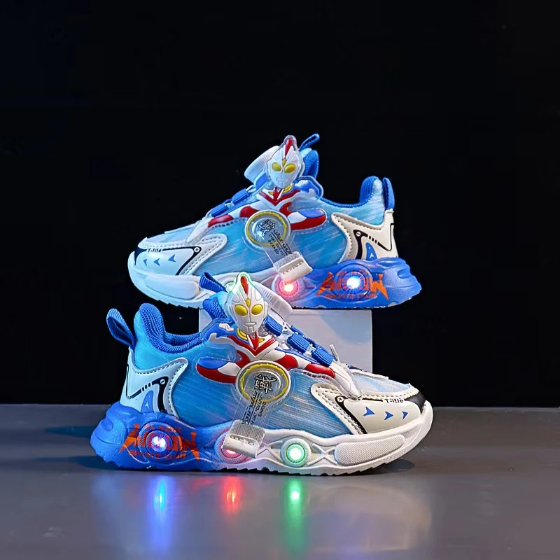 儿童鞋子春秋新款时尚男童运动鞋亮灯带卡通旋转纽扣软底透气防滑