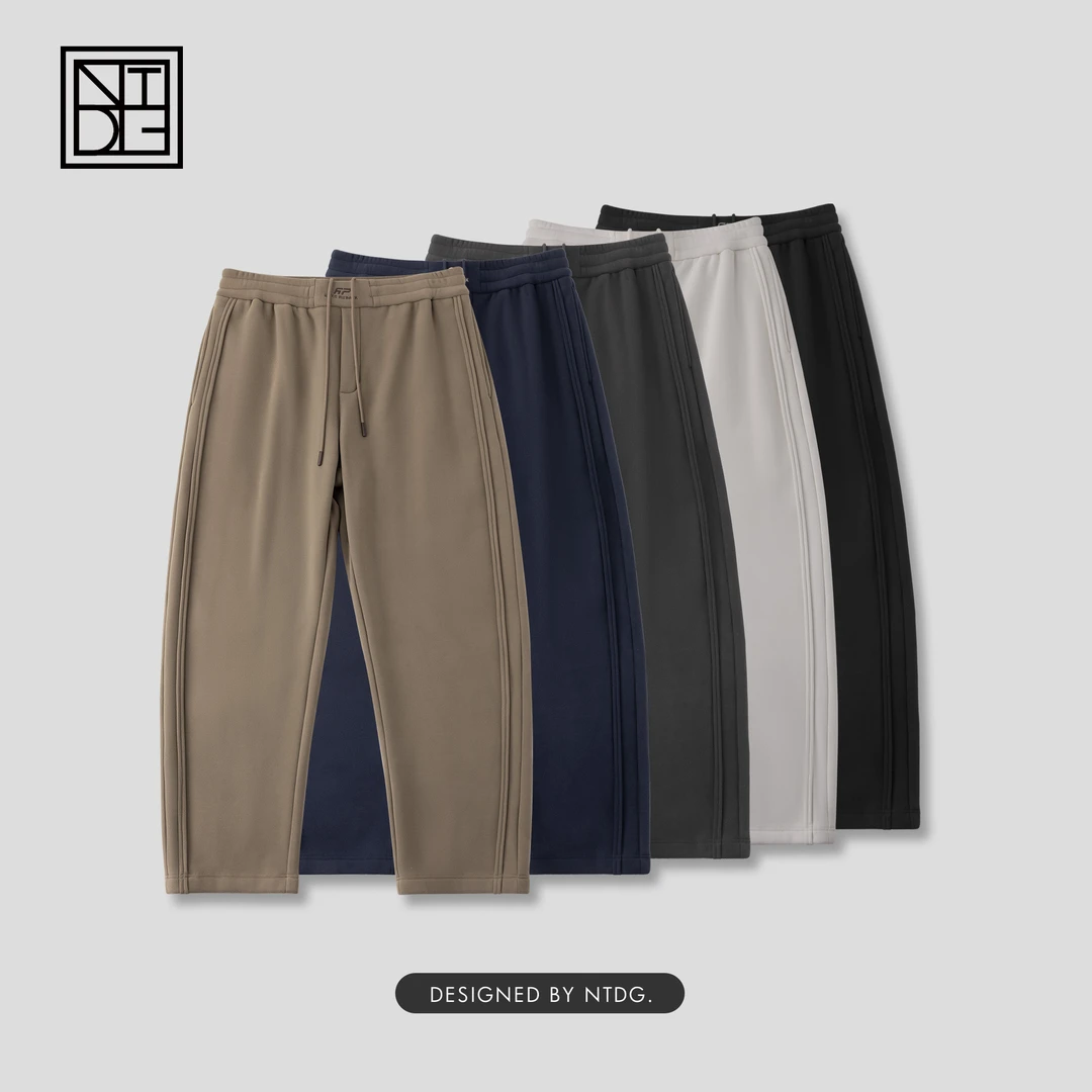 冬季加绒几何线剪裁防风裤加厚休闲弯刀裤9W0885