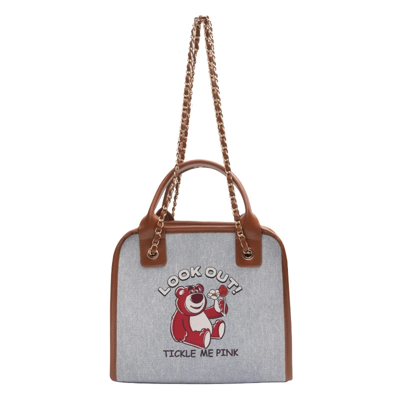 阪织屋迪士尼草莓熊正版联名通勤时尚单肩包休闲包外出包包女百搭