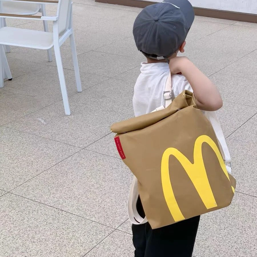 男孩纸袋子双肩包网红麦当劳儿童帆布书包新款幼儿园女童洋气背包