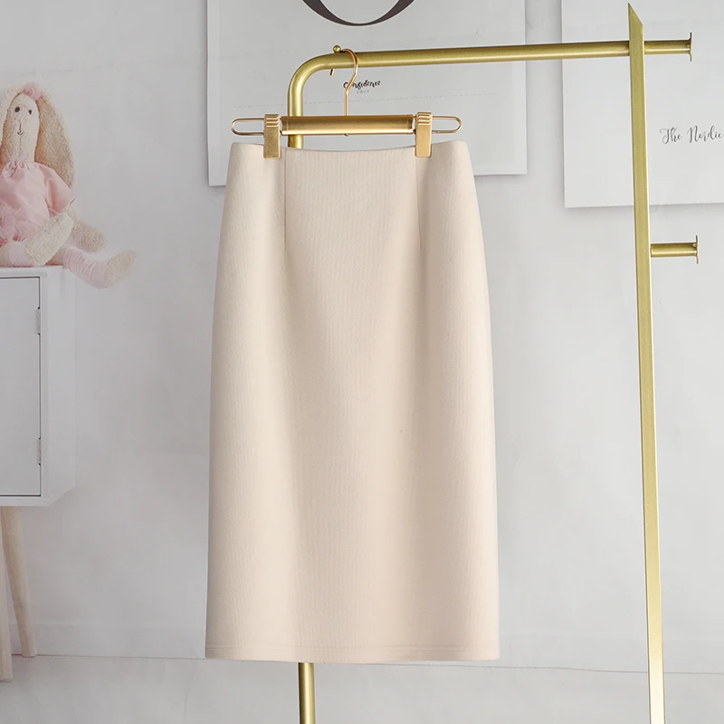 加厚米白色半身裙女秋冬款2025新款小个子针织a字裙后开叉中长款