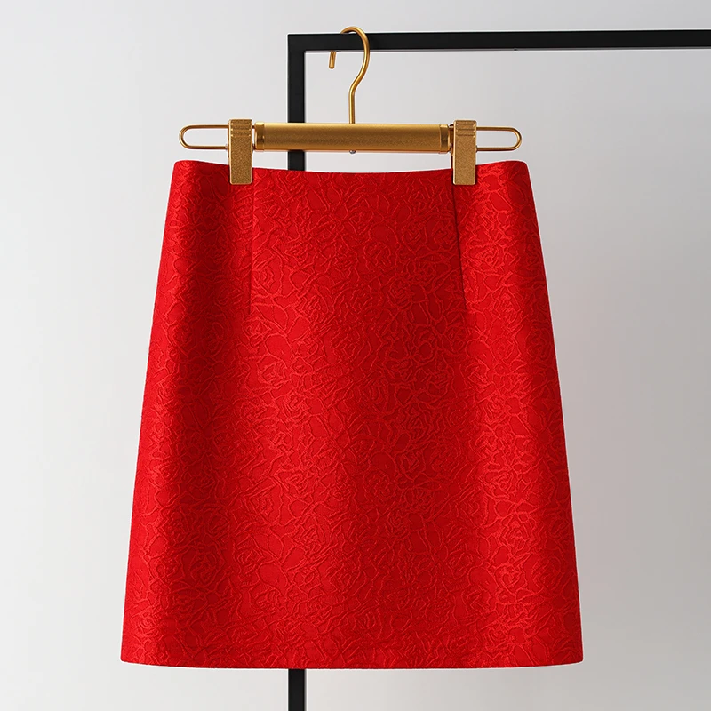 过年高端红色提花短裙半身裙女秋冬2026新款高腰a字裙包臀一步裙