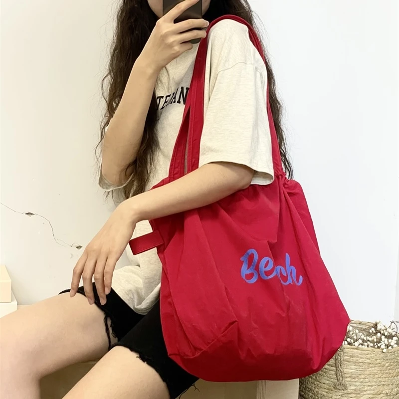 韩版新款字母印花包包女大容量尼龙单肩包休闲百搭上班族手提包