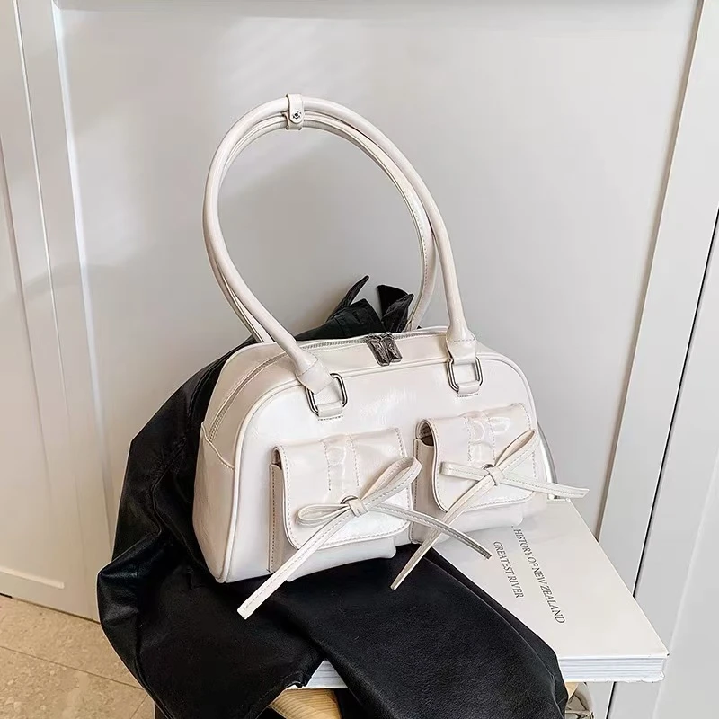 蝴蝶结辣妹单肩腋下包包女2024新款手提枕头包保龄球包时尚通勤包