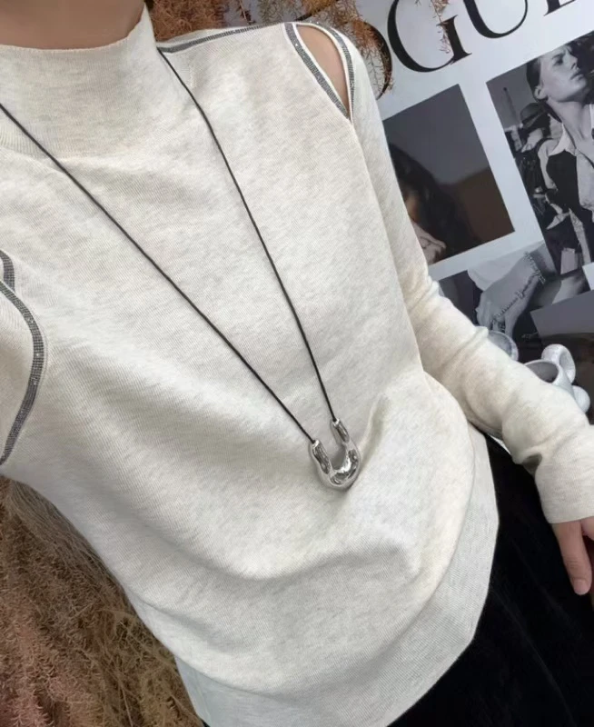 高档设计感露肩亮钻针织衫修身显瘦长袖打底衫