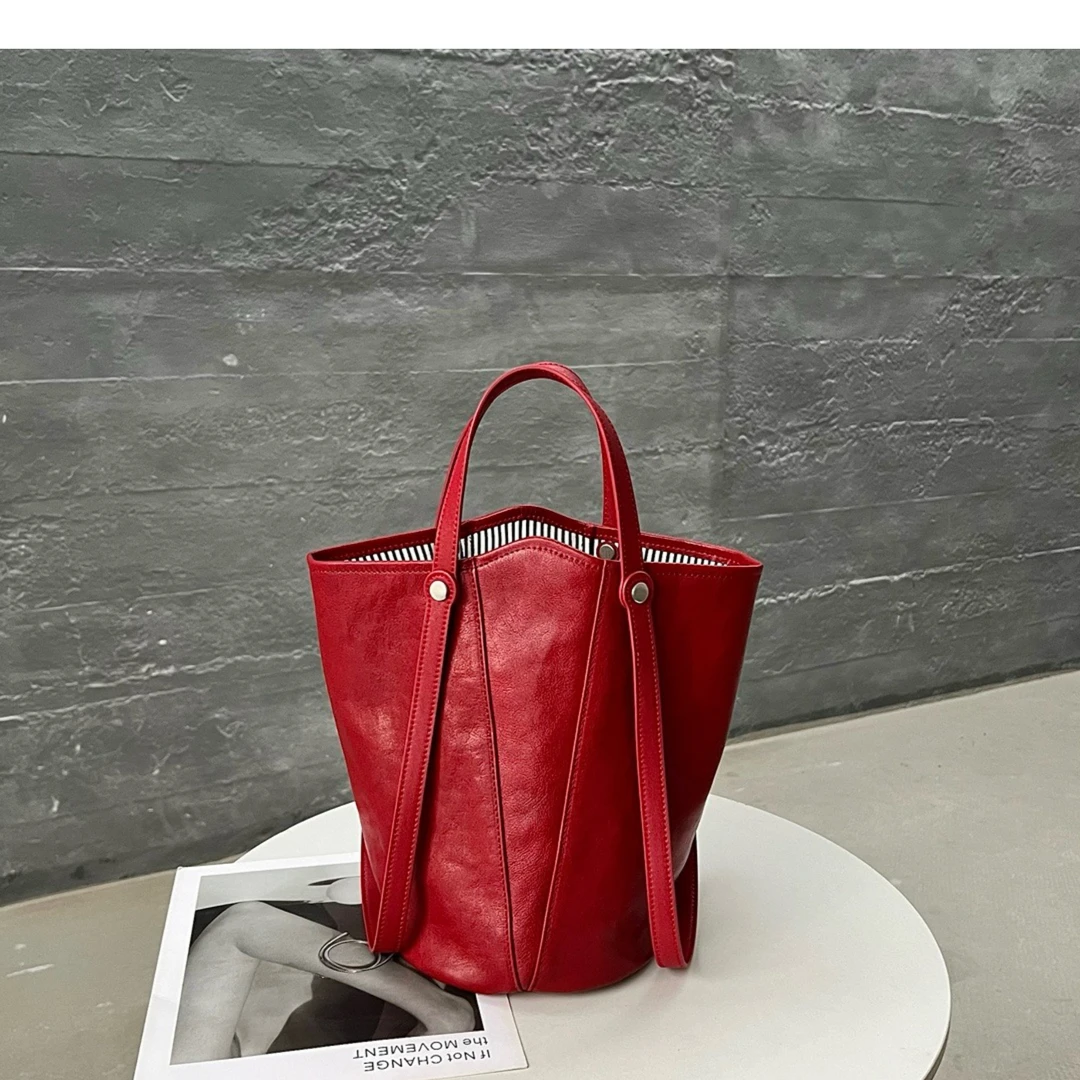 今年流行爆款手提红色新娘结婚包女2026新款秋冬高级感小众水桶包