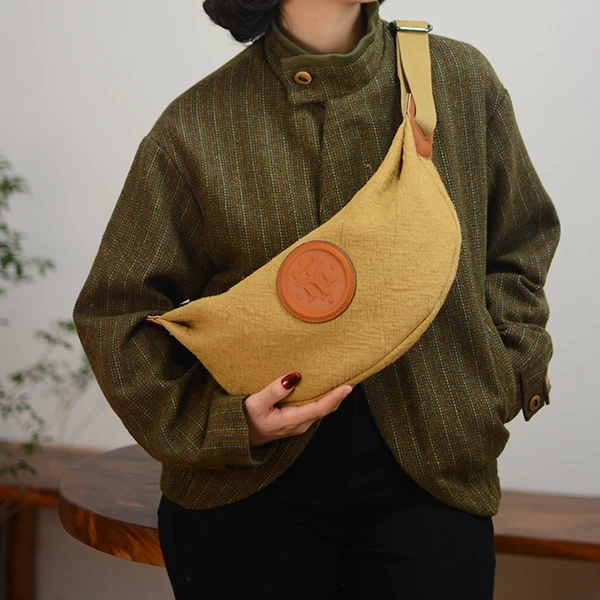 原创2025新款复古棉麻饺子包慵懒风文艺单肩包简约大容量斜跨包