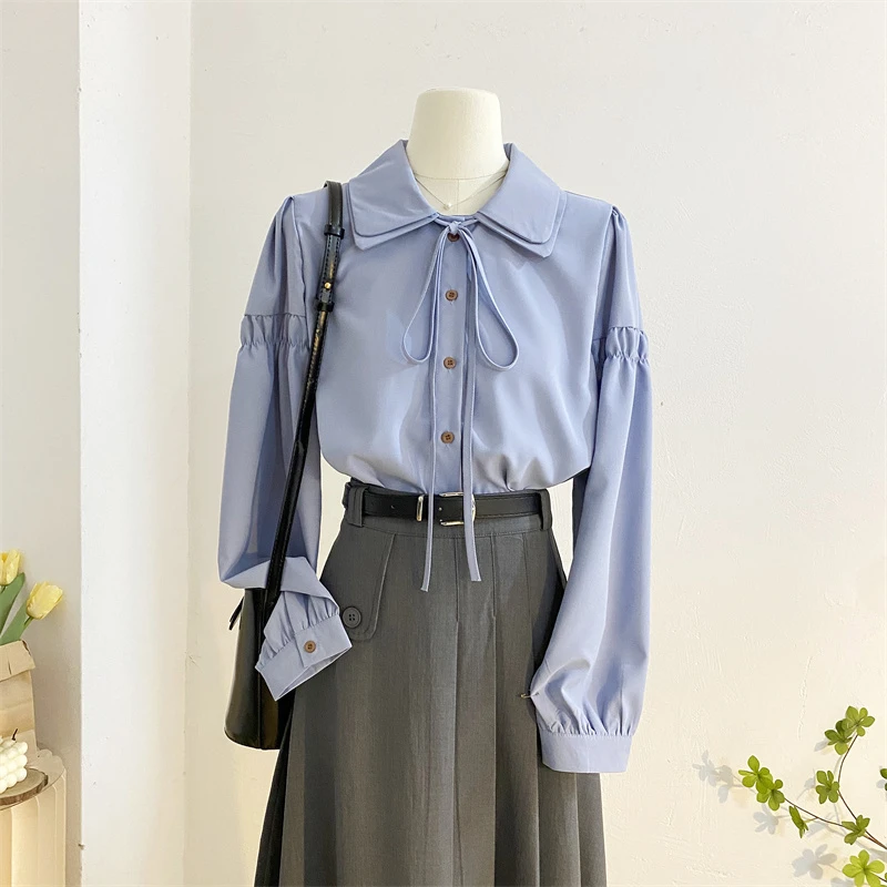 复古polo领系带蝴蝶结长袖衬衫女2024春设计感宽松甜美泡泡袖上衣