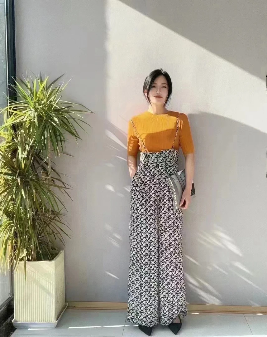 易缔媤花边阔腿裤