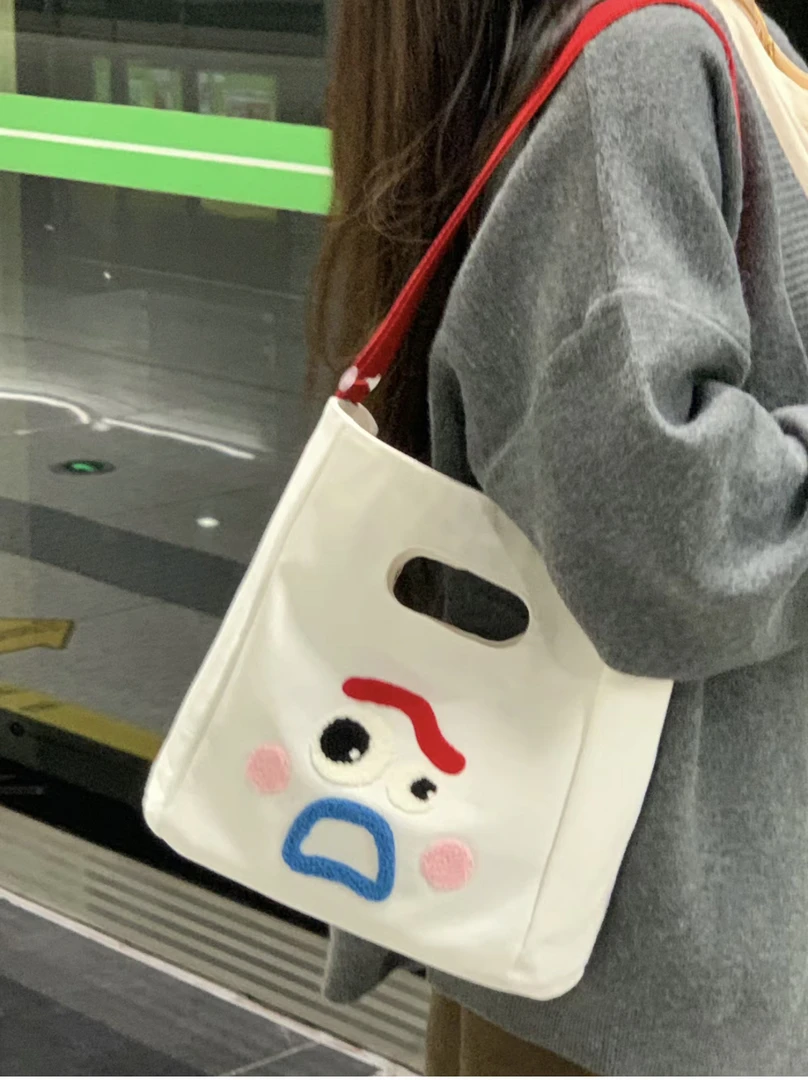 搞怪表情可爱卡通撞色帆布单肩斜挎包包女学生大容量手提托特包