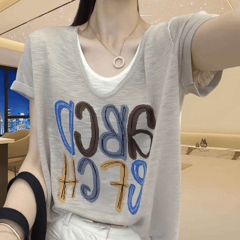 莫奈2024夏季休闲大码短袖圆领宽松假两件气质字母印花t恤上衣女