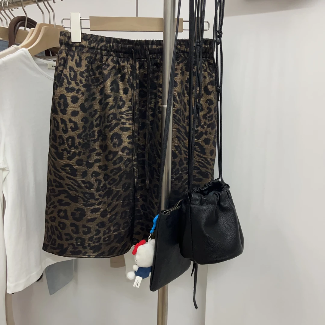 特价清新款时尚休闲松紧腰豹纹群中裙女不规则百搭印花半裙半身裙