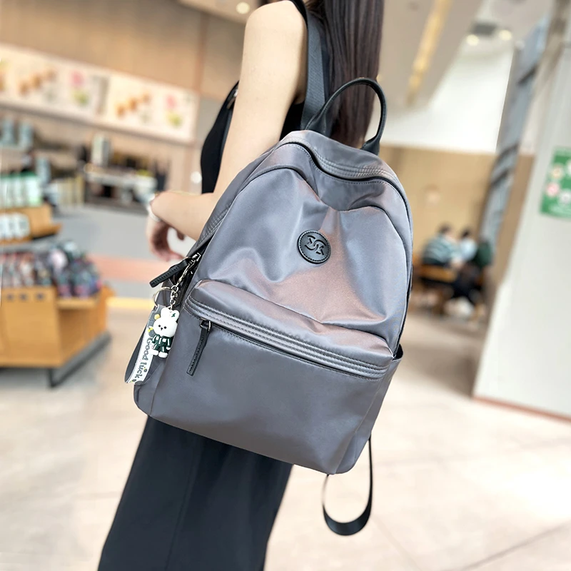 韩国大容量休闲旅游百搭双肩包男女新款轻便防水通勤电脑牛津背包