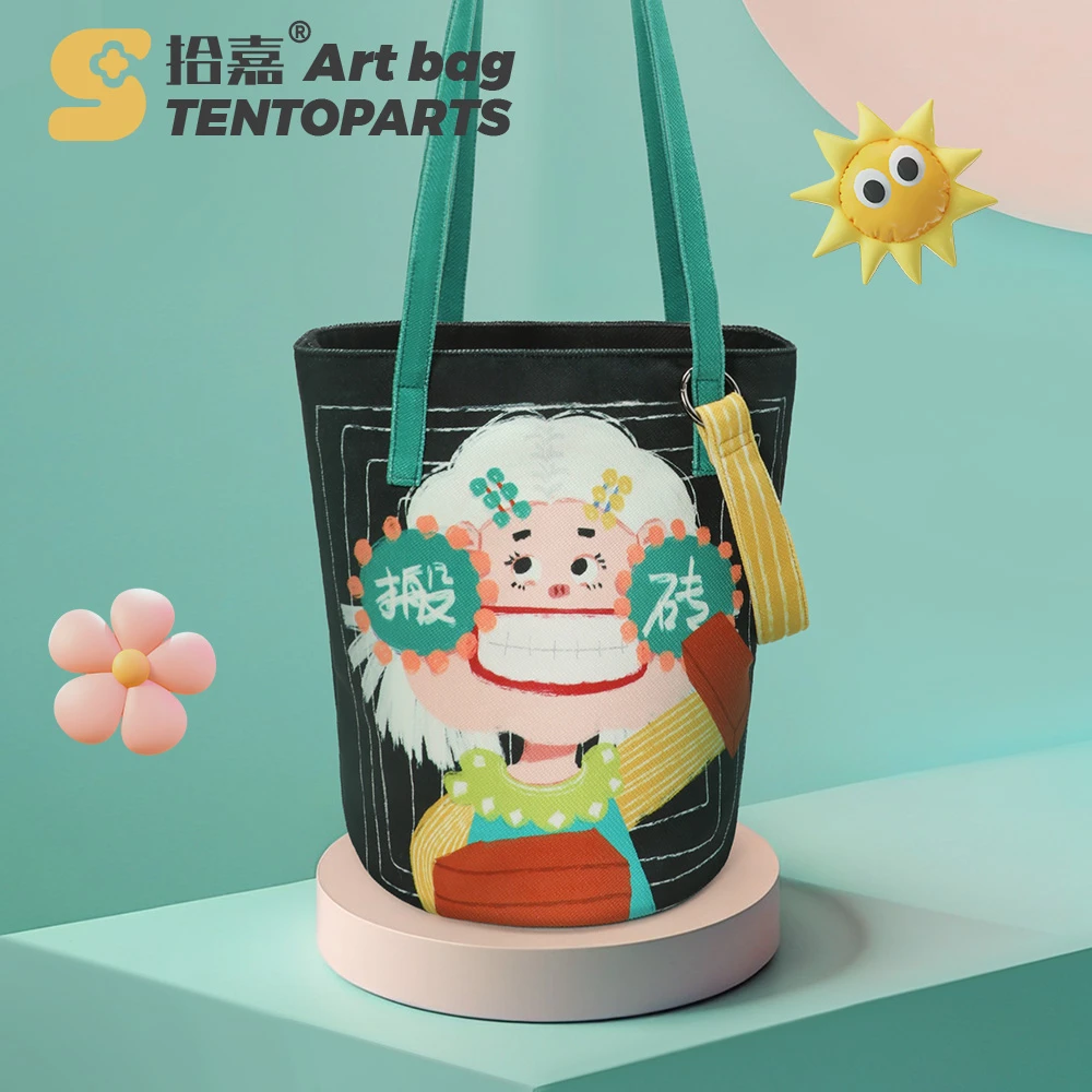 拾嘉/搬砖女孩 单肩大水桶包大容量原创科技布包卡通文艺学院风