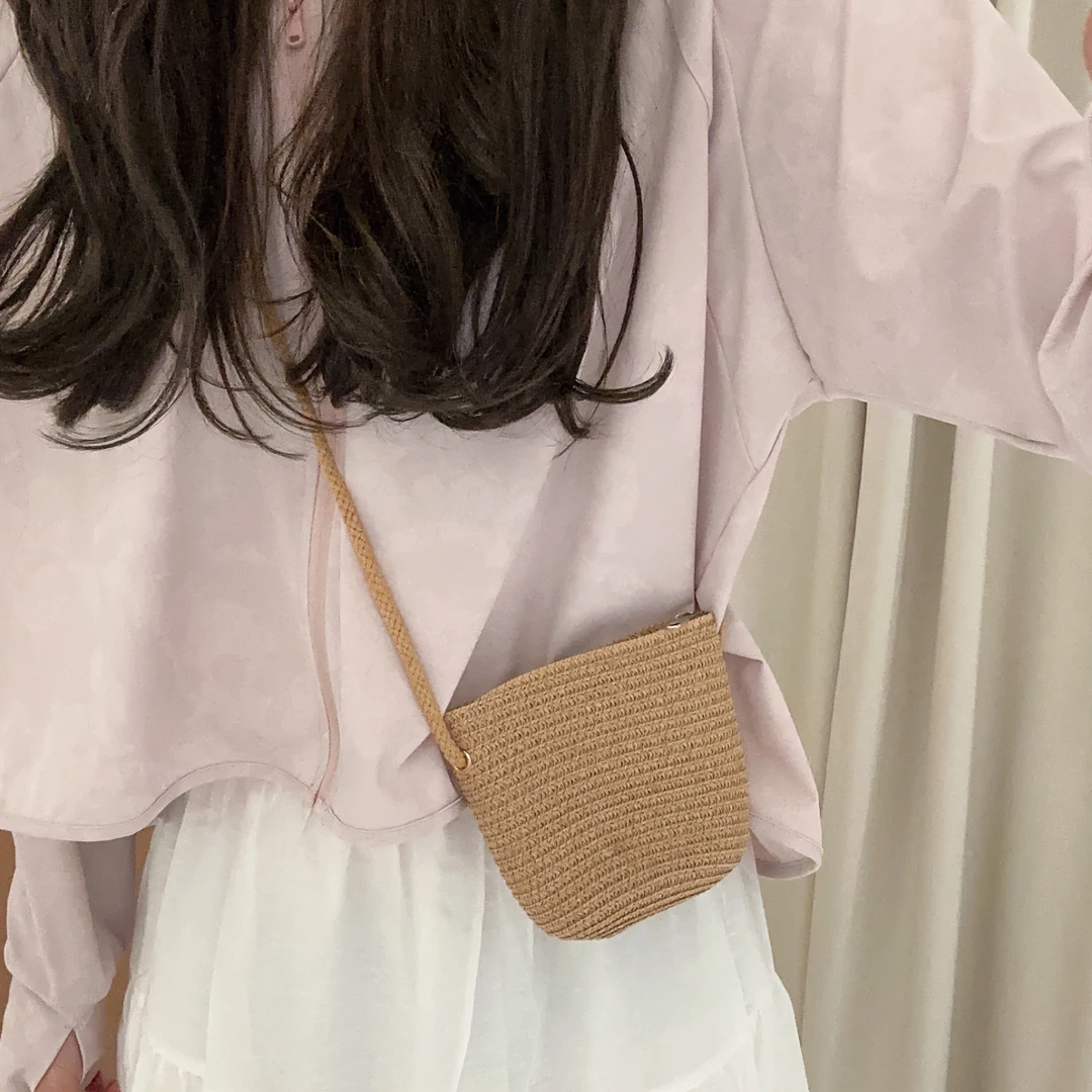 德芬妲手工编织包夏季新款水桶包海边度假沙滩包单肩斜挎包复古草