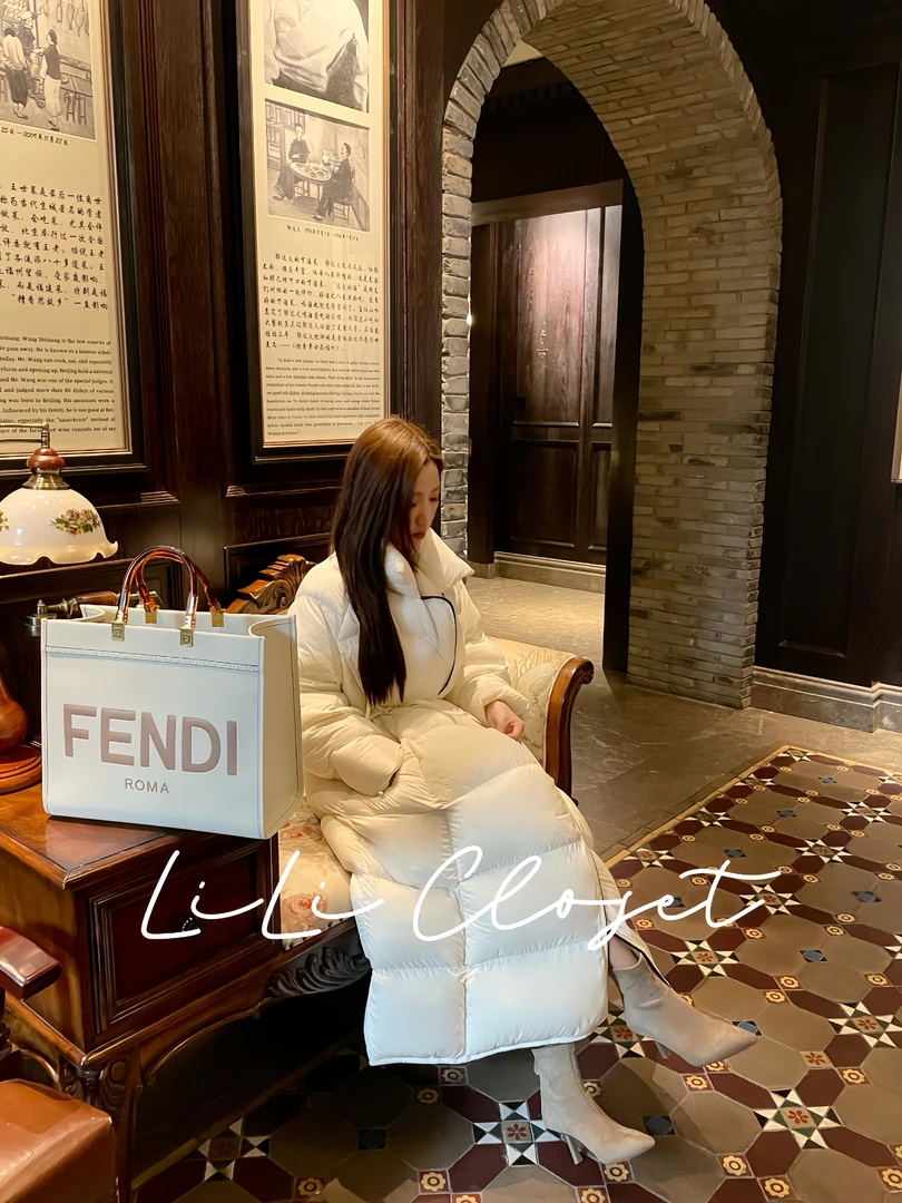 【coco小姐】冬季腰部抽绳新国标白鹅绒保暖女款气质羽绒服长款外套