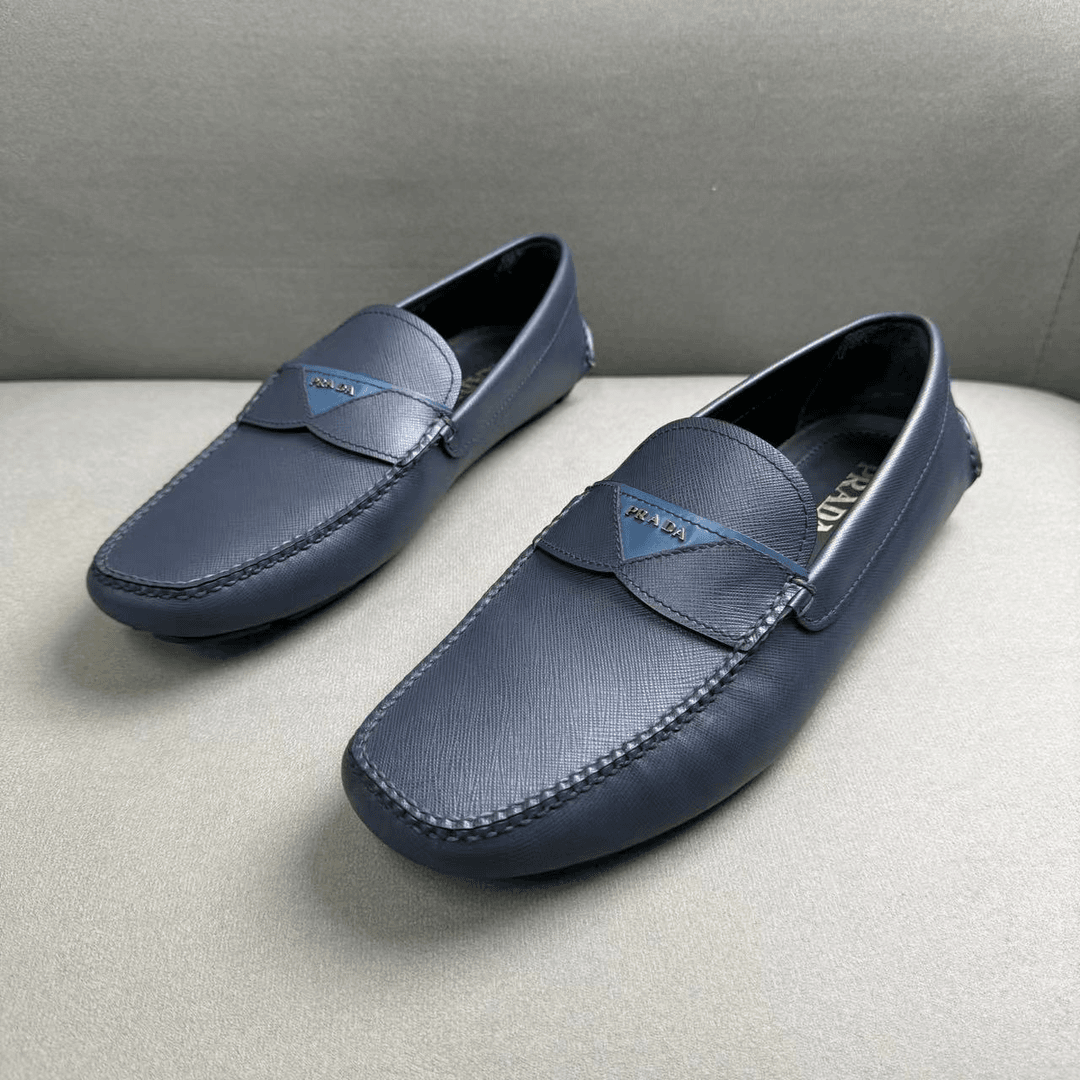 Prada/普拉达蓝色三角logo时尚软底豆豆鞋 43码/全新