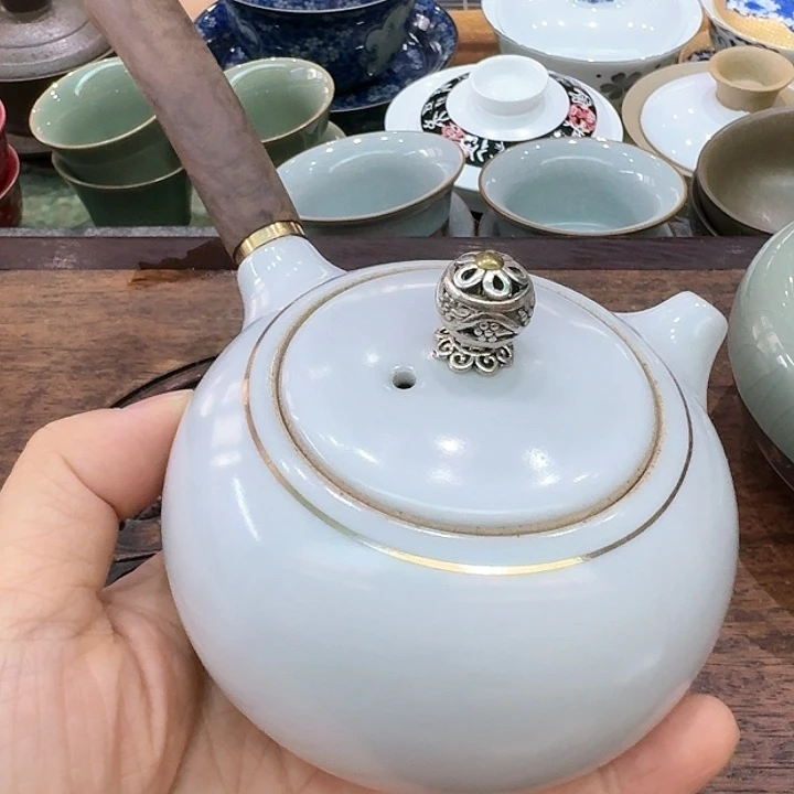 实木侧把壶一个。。。