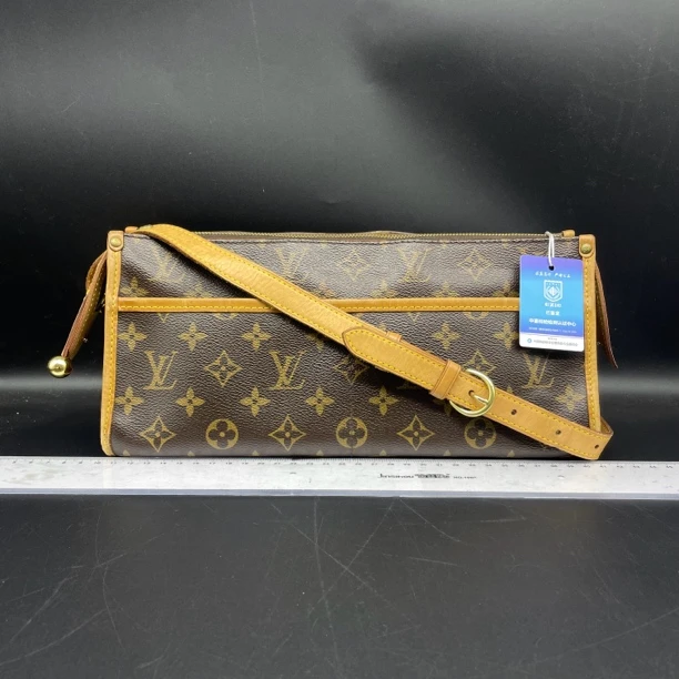 95新 LouisVuitton/路易威登 老花三角金球斜挎包/货号12161