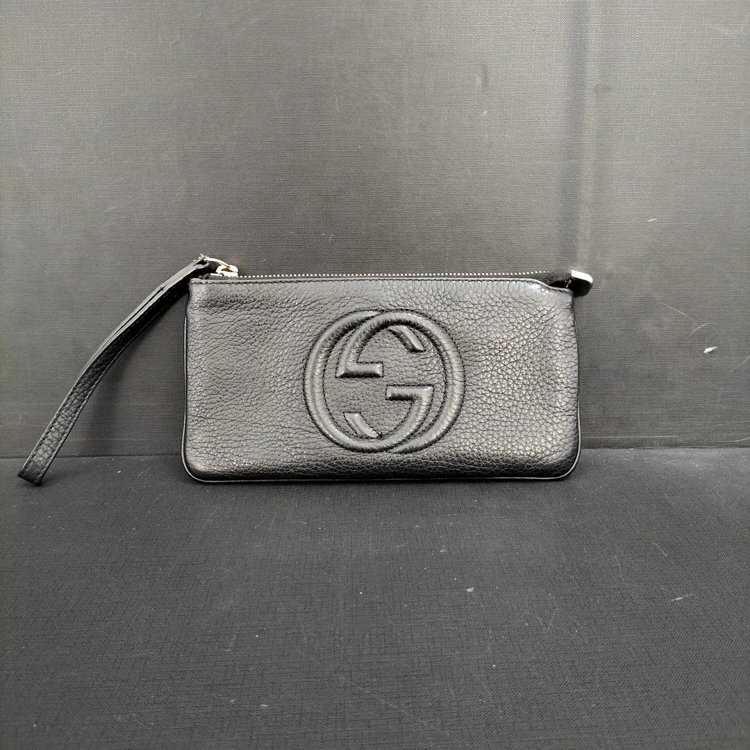 95新 GUCCI/古驰 95新古驰手拿包／货号11238-2
